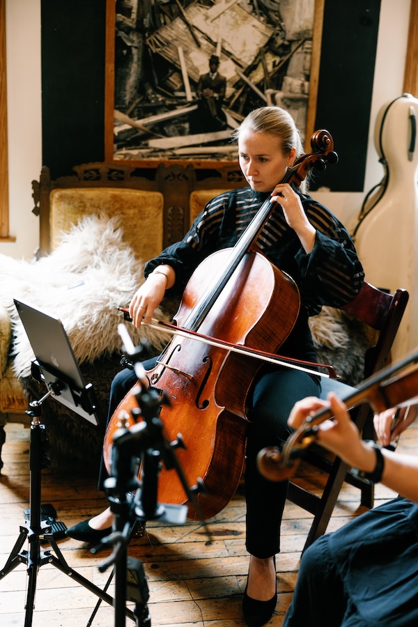 String duo performing at intimate gathering